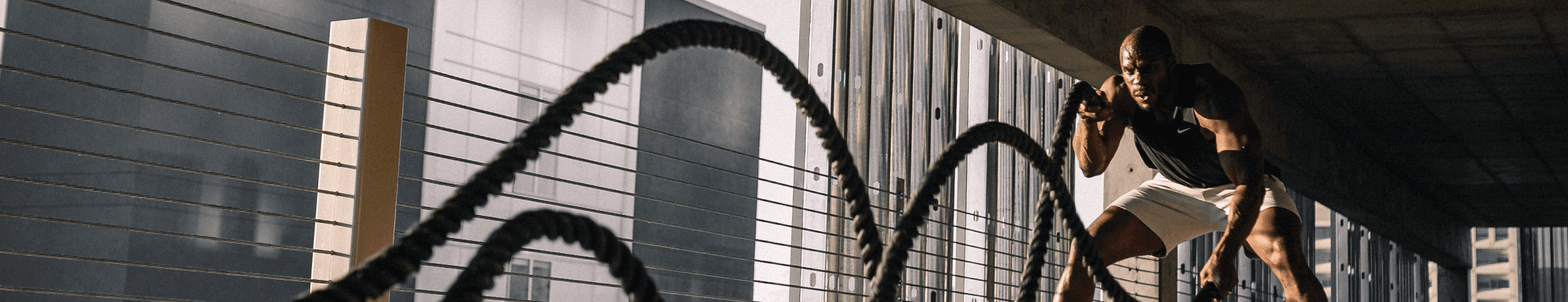 Man using battle ropes